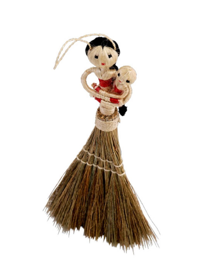 Earth tree handmade Fair trade -- Mabian woman holding a small broom
