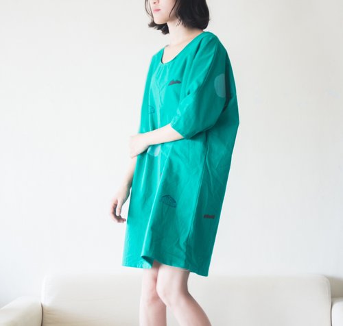 Montenegro, stone, green pond, and a dog, the wide green dress