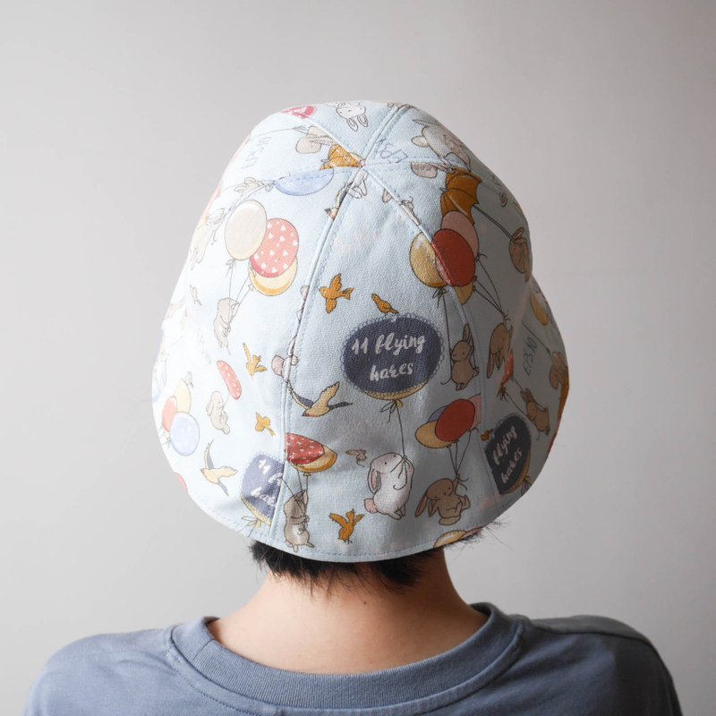 雙面漁夫帽-天藍兔子氣球 - 帽子 - 棉.麻 多色