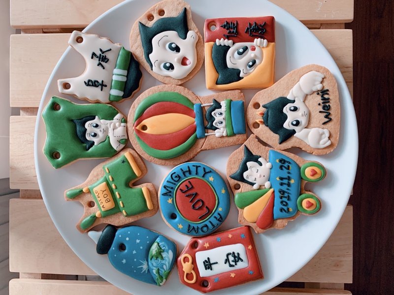 The machine boy icing biscuits collects saliva