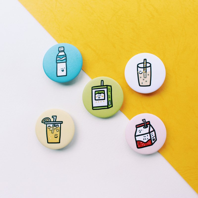 A pile of drinks / badges