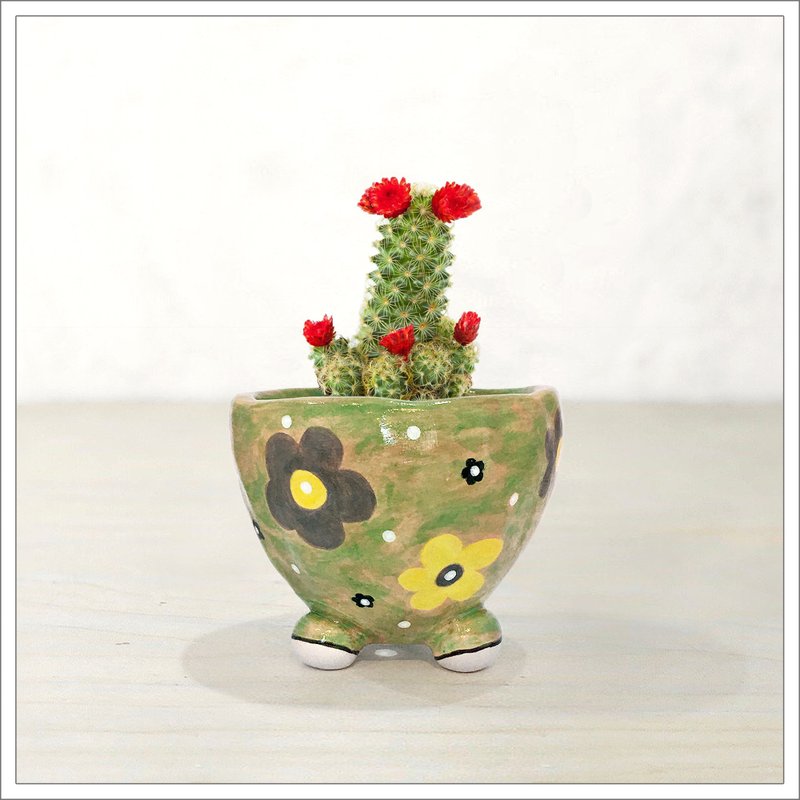 Hand pinched and painted ceramic pot, cute flowers in camouflage pattern
