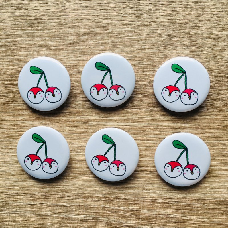 Cherry penguin badge