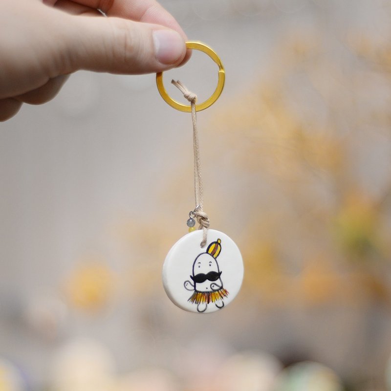 a little cute character keychain handmade necklace from Niyome clay.