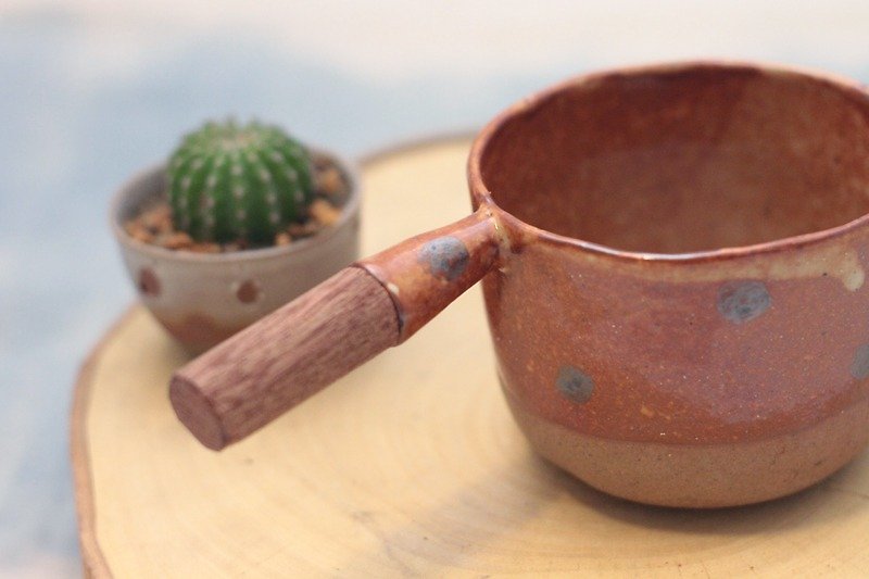 3.2.6. studio: Handmade ceramic coffee cup with wooden handle. - Items for Display - Paper Brown