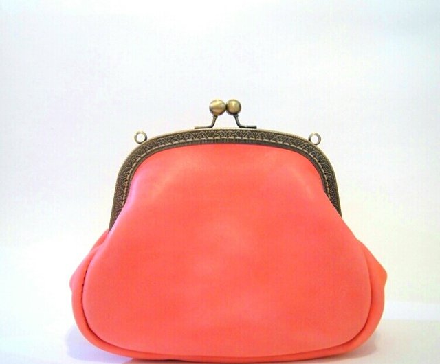 pink and orange clutch bag