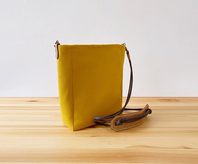 Mustard yellow sling discount bag