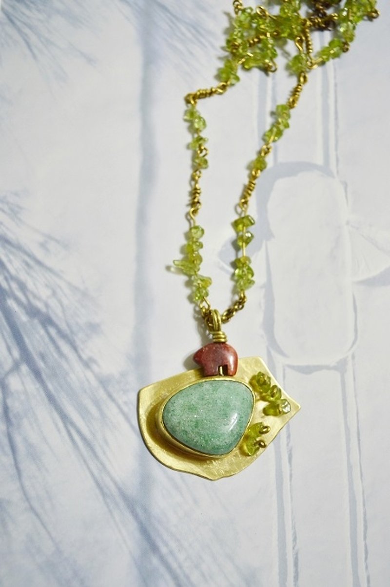 the polar bear is walking in the prairie。Brass Necklace - Necklaces - Other Metals Multicolor