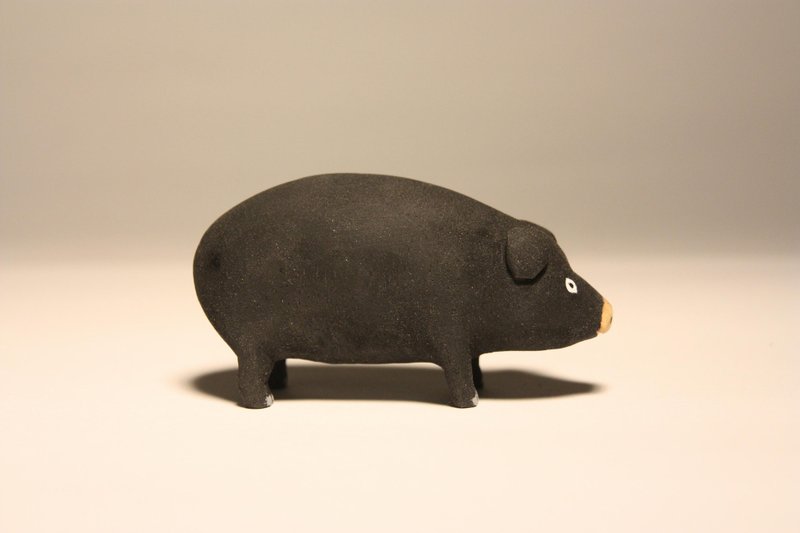 department of small animal healing carvings _ pig black pig