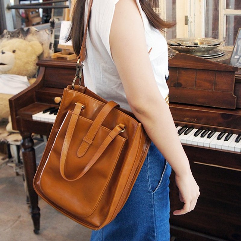 catXbow-knot hand-stitched_cowhide portable shoulder bag_Taiwan design_limited handmade_caramel color - Messenger Bags & Sling Bags - Genuine Leather Gold