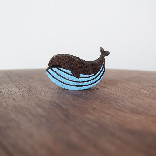 wooden brooch whale