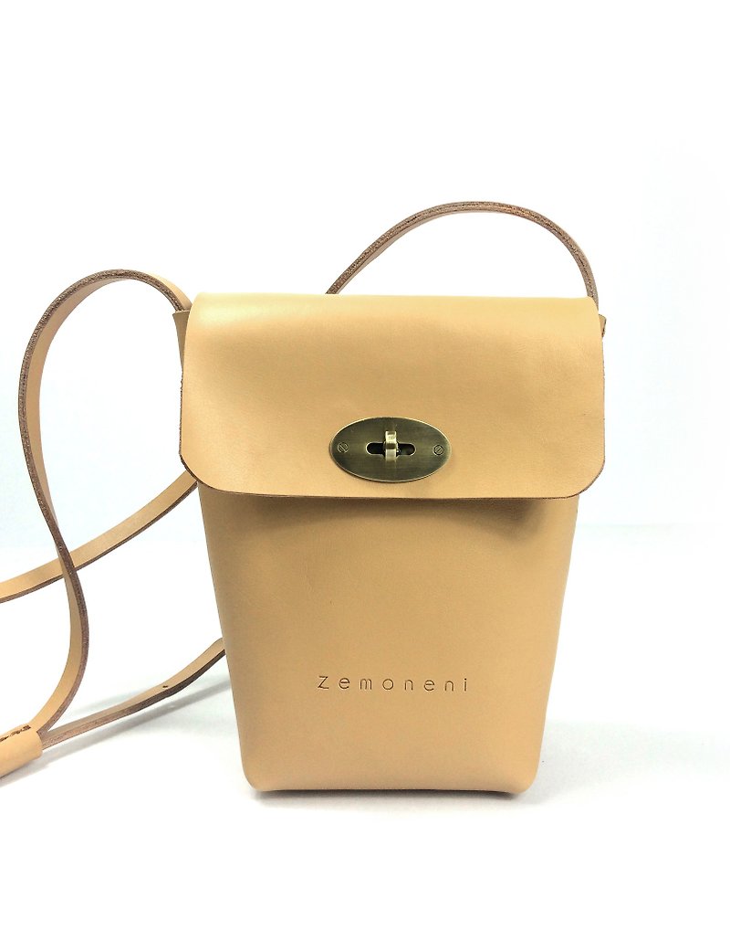 Zemoneni Beige color leather unisex shoulder bag with metal turn lock - กระเป๋าแมสเซนเจอร์ - หนังแท้ สีทอง