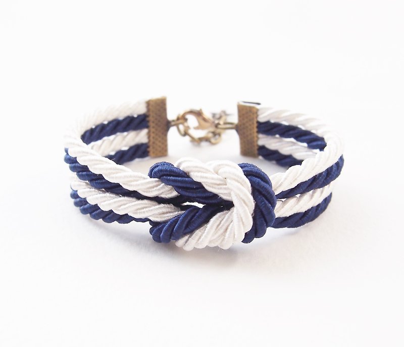 Double knot bracelet in navy blue and white with brass materials  - สร้อยข้อมือ - วัสดุอื่นๆ สีน้ำเงิน