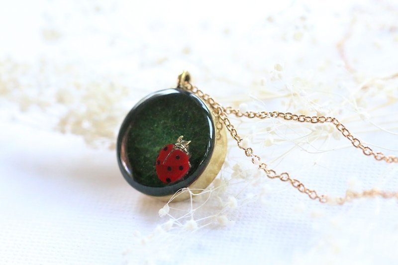 Hot ladybug pendant on grass necklace by linen. - Necklaces - Other Metals 