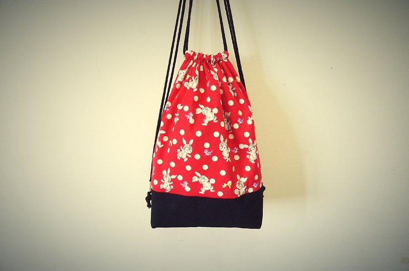 Rabbit caught red dot black (pouch Backpack) - Drawstring Bags - Other Materials Red