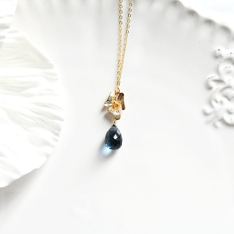 A versatile Stone crystal that purifies everything and brings good luck London Blue Quartz and Flower Necklace April Birthstone