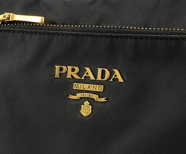 PRADAロープロゴ　ストアギャランティゴールドプレート PRADAロープロゴストアギャランティゴールドプレート