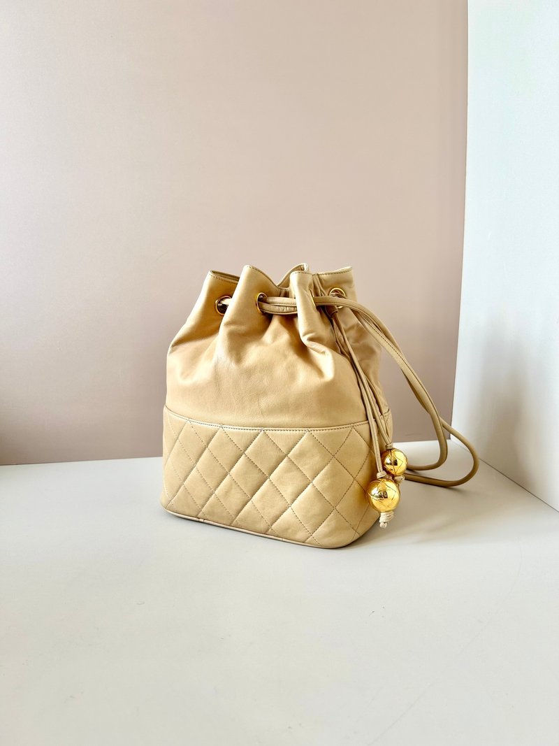 【LA LUNE】Second-hand Chanel sheepskin gold ball drawstring bucket shoulder bag - Messenger Bags & Sling Bags - Genuine Leather Khaki