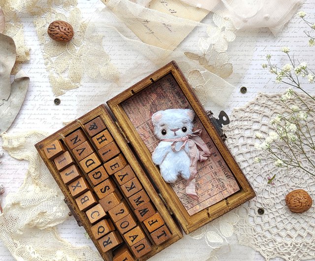 Teddy Bear on Blue Book — {{ shop }}