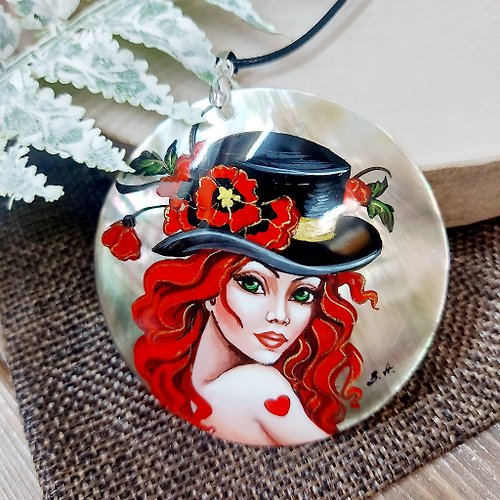 Charm.arts Ginger haired Mad Hatter girl with green eyes on hand painted pearl necklace
