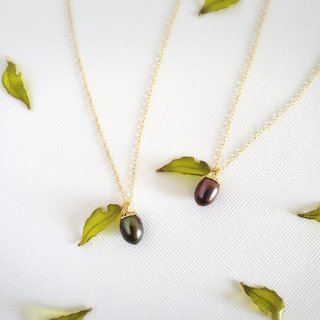acorn &amp; worm-eaten leaf necklace
