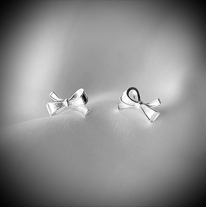 C&W s925 sterling silver three-dimensional elegant cute little bow simple and fashionable earrings - Earrings & Clip-ons - Sterling Silver Silver