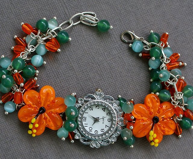 手作りのランプワークハイビスカスビーズと緑のビーズの花の時計とオレンジ ショップ InnaKirkevichLampwork 腕時計  Pinkoi