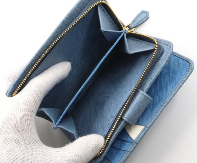 PRADA 水色 二つ折り財布 日本直送】プラダ PRADA 二つ折り財布 サフィアーノ ASTRALE 水色