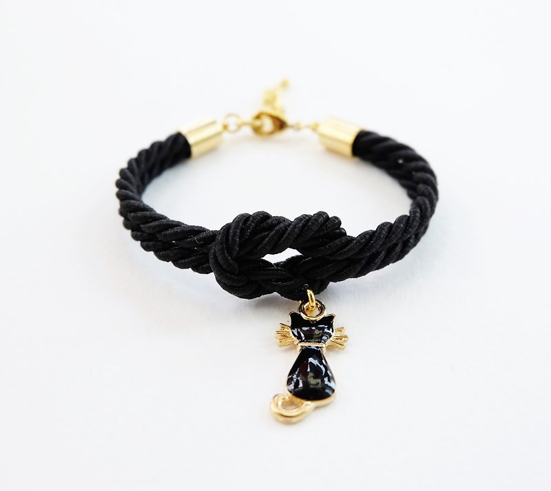 Black knot bracelet with kitten charm - สร้อยข้อมือ - วัสดุอื่นๆ สีดำ