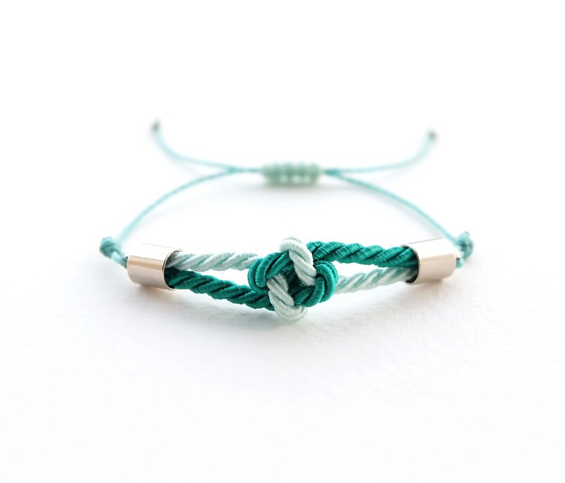 Tiny flower knot rope bracelet in Light mint / Sea green - สร้อยข้อมือ - เส้นใยสังเคราะห์ สีเขียว