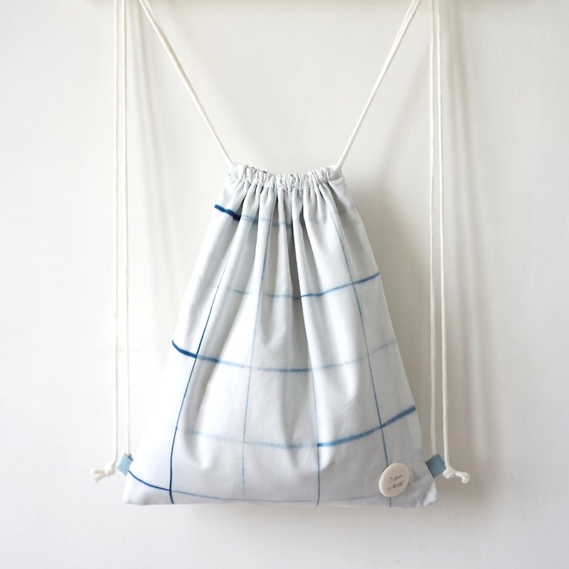 S.A x Line, Indigo dyed Handmade Checks Pattern Backpack - กระเป๋าหูรูด - ผ้าฝ้าย/ผ้าลินิน ขาว