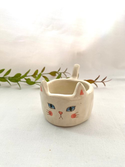 cher’s pottery Handmade ceramic mug with white cat pattern with a tail as an ear