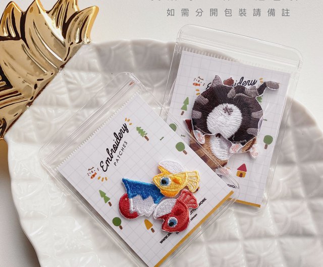 刺繍ワッペン・ピンバッジ | だらだらするカワウソ