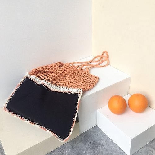 Merrymetric Soft Orange-Black Gradie crochet bag