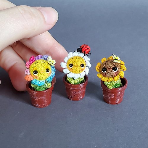 Microtoysby Miniature crocheted flowers in pots. Sunflower, chamomile, rainbow flower.