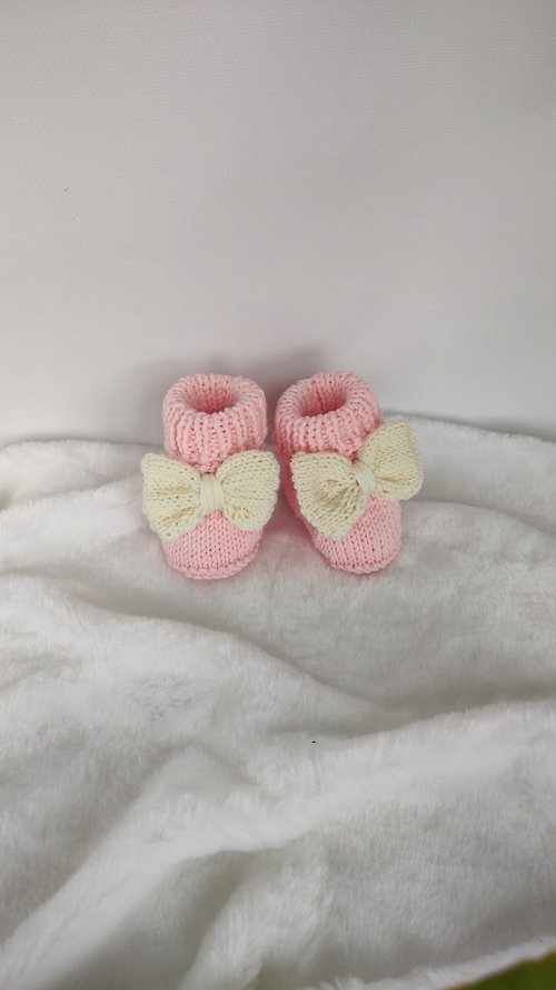 Knitting magic Very cute booties for babies. Made of 100% merino wool. This