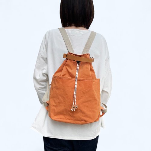 巾着リュック（A4サイズ)　キルティング生地×オレンジ　ハンドメイド ちょこっとリュック オレンジ KONBU 撥水加工ナイロン素材 巾着