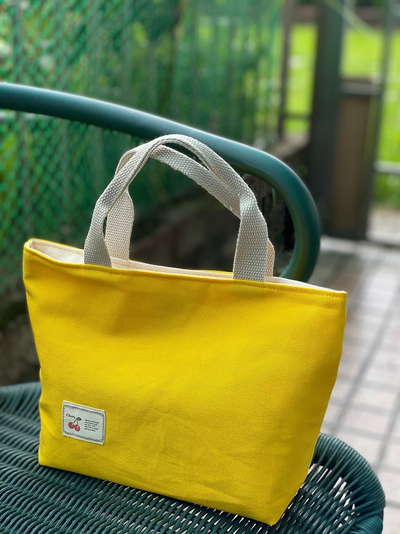 Bright yellow macaron tote bag runs everywhere (small, S-size) - กระเป๋าถือ - ผ้าฝ้าย/ผ้าลินิน สีเหลือง