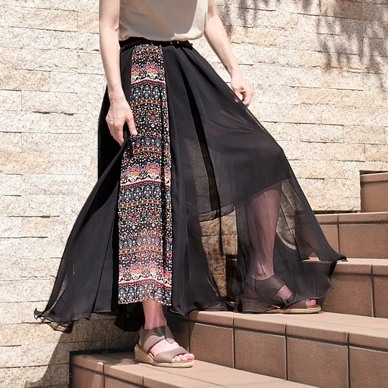 A circular chiffon long skirt with a small floral and paisley pattern, featuring ruffled hem that flutters in the wind and an abundance of fabric. - Skirts - Polyester 