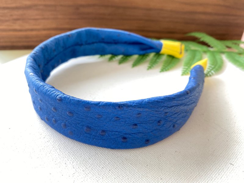 Ostrich leather hair band in sapphire blue colour