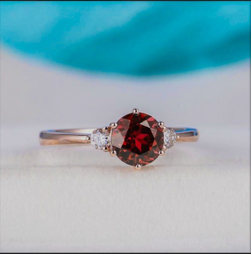 ロードライトガーネット リング 38.49ct オーバルミックスカット