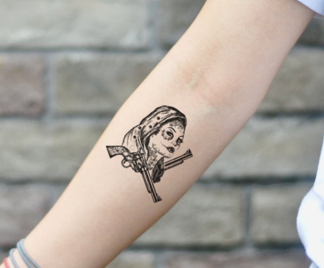Amazing Gangster Gun In Girl Hand Tattoo On Girl Right Shoulder