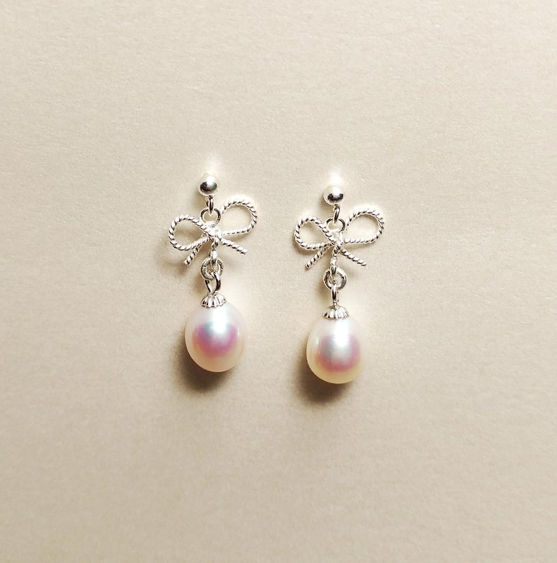 Bow pearl earrings - Earrings & Clip-ons - Other Metals White