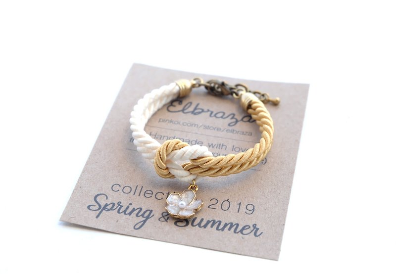 Matte white / gold knot rope bracelet with white flower charm - สร้อยข้อมือ - วัสดุอื่นๆ สีทอง