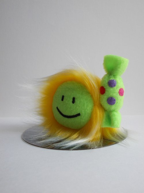Smile, Smiley, green smiley face with candy, tiny cute toy, plush furry  emoji