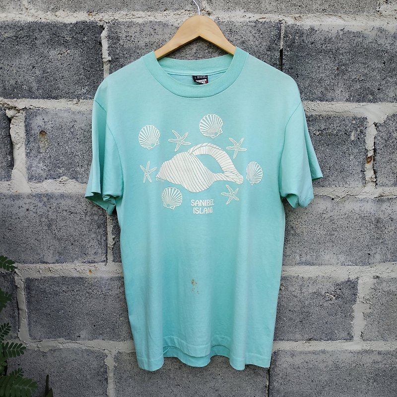 เสื้อยืดวินเทจ 80s Vintage Sanibel Island Graphic T-Shirt Size L Single Stitch - เสื้อยืดผู้ชาย - ผ้าฝ้าย/ผ้าลินิน สีเขียว