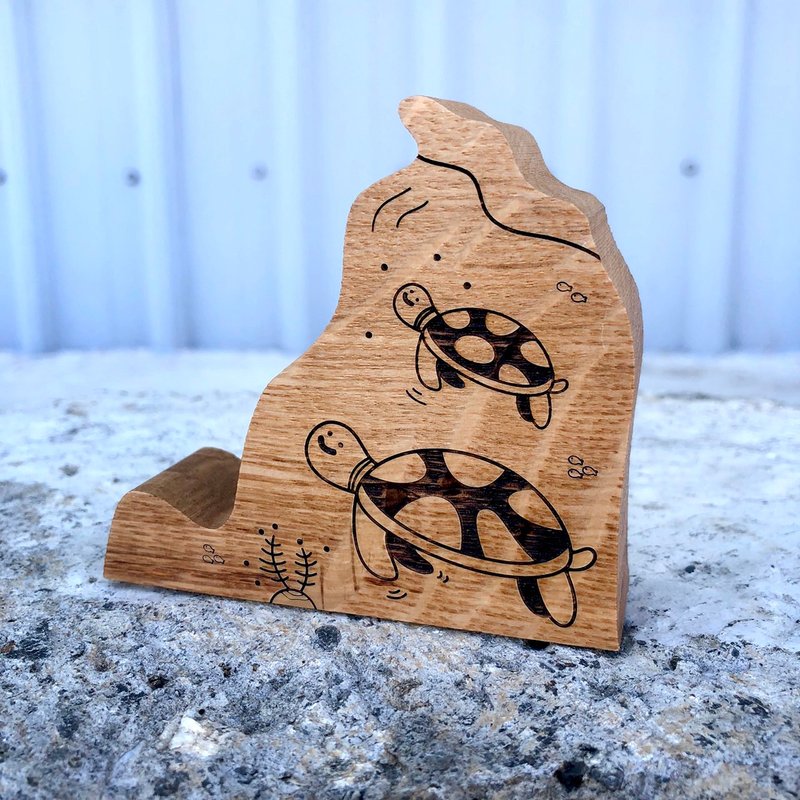 Turtle's production center cell phone holder white oak - Phone Stands & Dust Plugs - Wood Brown