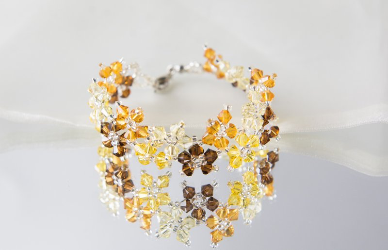 Shade of yellow multiflora swarovski bracel, 7 inches and 2 inches chain - สร้อยข้อมือ - คริสตัล สีเหลือง