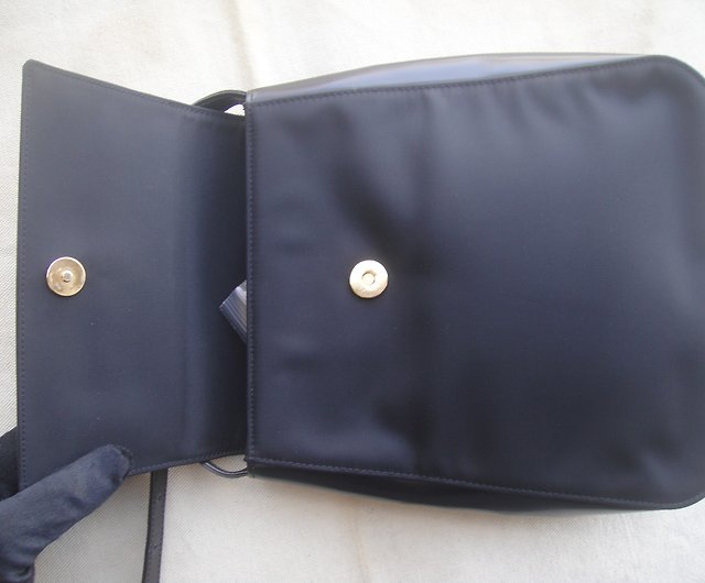 Versace Gianni Vintage Ostrich Skin Effect Mini Backpack, $1,597, farfetch.com