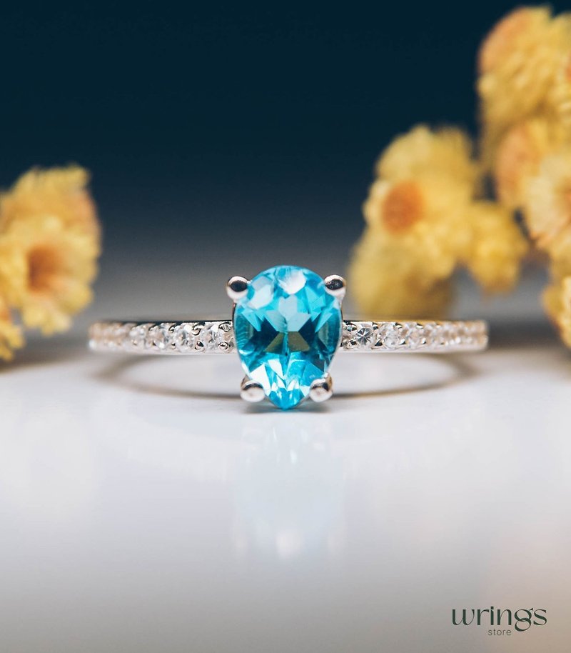 Large Pear Swiss Blue Topaz Engagement Ring & CZ White Side Stones - 戒指 - 純銀 藍色